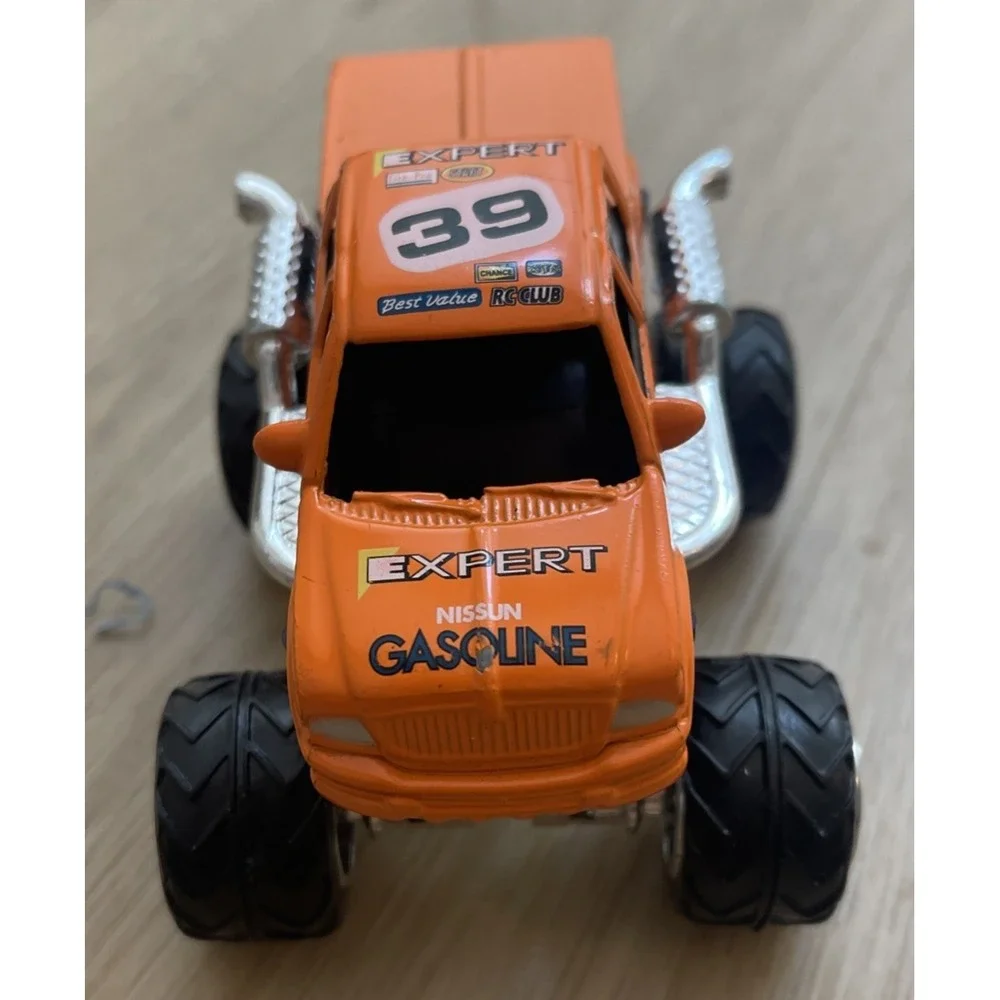 Monster Truck #39 Expert Gasoline Orange 4x4 Diecast Vehicle 1:43 4